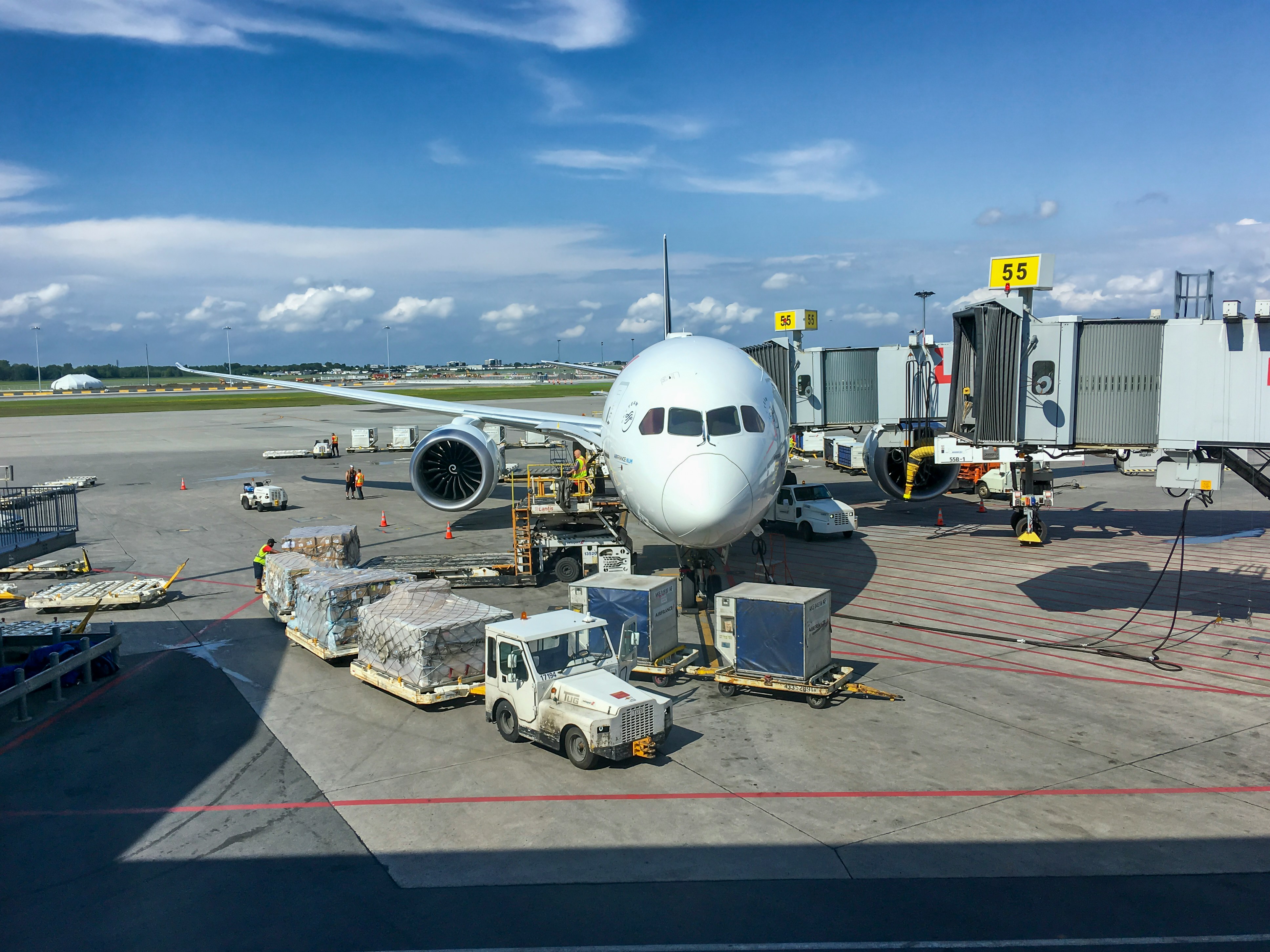 Cargo aircraft being prepared at an airport